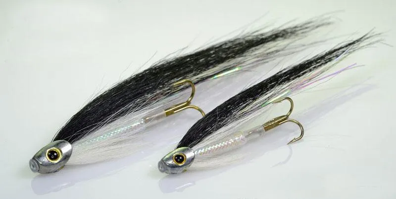 Fish Skull Sunray Shadows - Flymen\'s Fish Skulls on a classic hair wing salmon fly. Tied by Icelandic fly-tier Jon Ingi Agustsson. Jon tells that the fly has been doing very well in Iceland, for instance for most of June and into July in the river Blanda a yellow/black version was the top producer