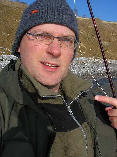 Intelligent life on Earth? - The sun makes me squint and look more than stupid. It's you there on my collar in the form af my podcast recording mike.